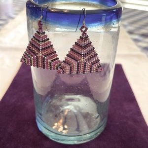 Hand beaded triangle earrings.
